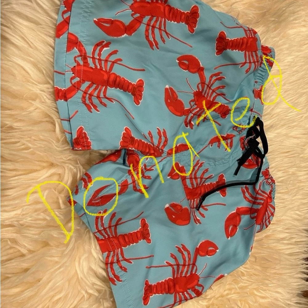 Swim suite size 10 never worn ( but these are for 5-6 years ) I would say